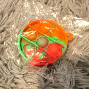 Green and orange mini keychain pop it
